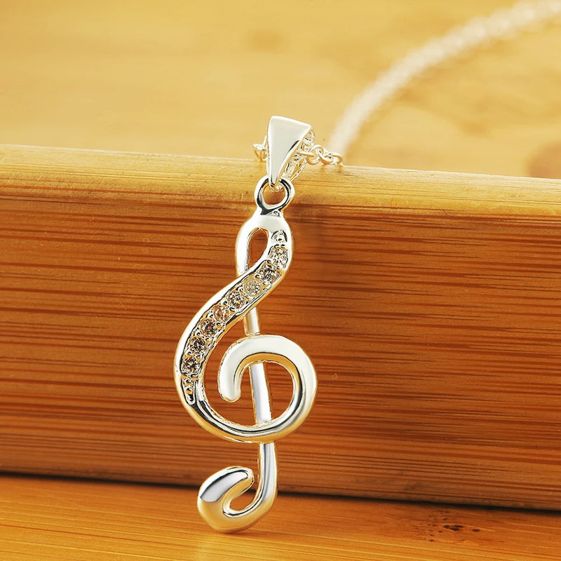 925 sterling silver crystal pendant necklace, featuring a chic musical note design.